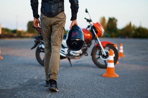 motorcyclist taking safety course with helmet